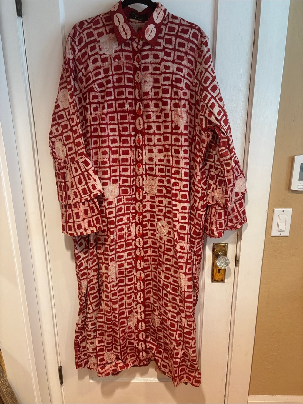 Zanaani Maxi dress.Red and white African print. Long sleeves with ruffles. 3X